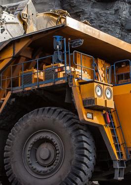 Dump truck collecting coal at a mining site